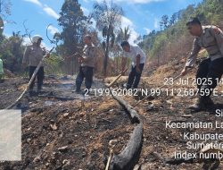 Polsek Laguboti Sigap dan Respon Cepat Berhasil Memadamkan Kebakaran Lahan