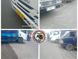 Dua Truk ELF Nopol L 8491 UL dan B 9237 DV Parkir Tidak Pada Tempatnya di Sebelah Pospol Tambaksari Kedung Cowek